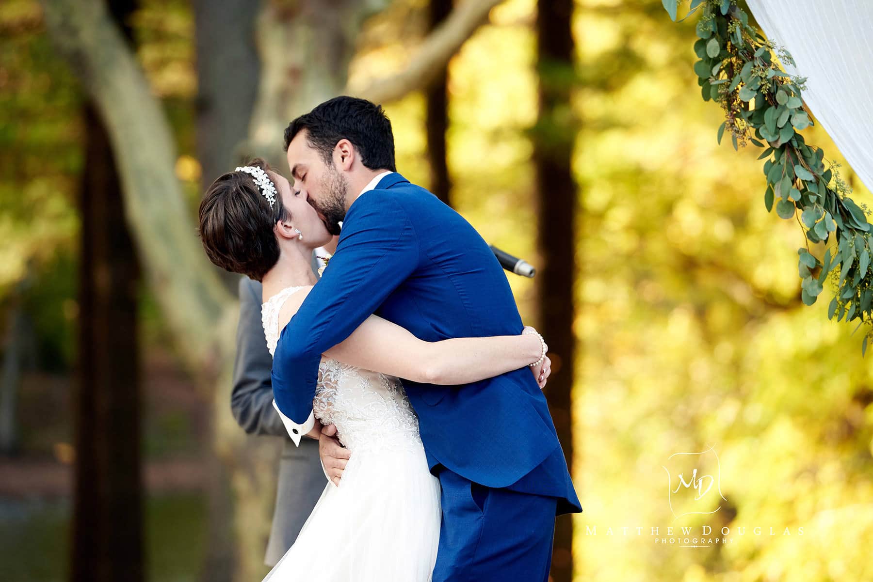 first wedding kiss at The Estate at Farrington Lake