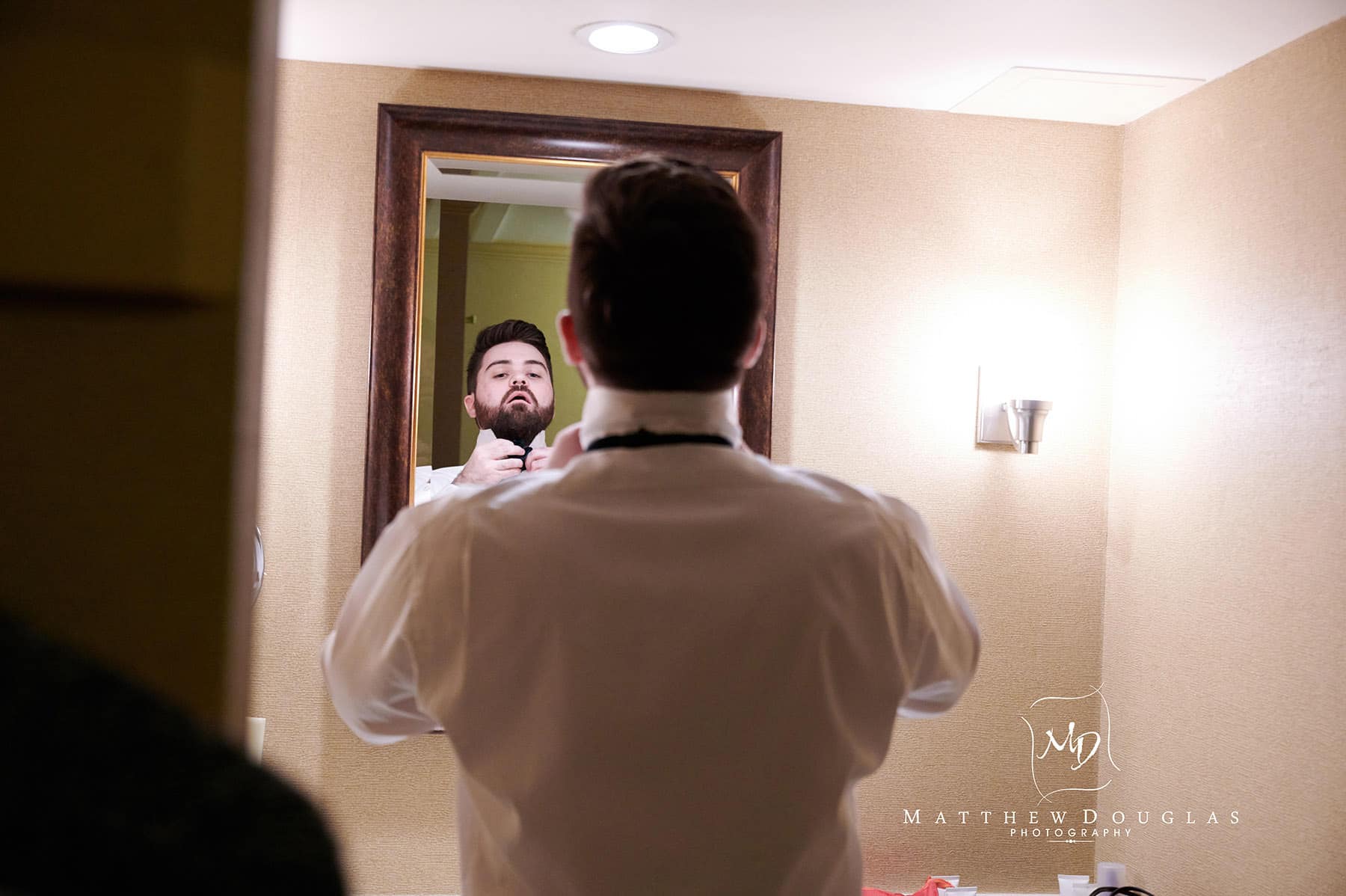 lambertville station inn wedding photo groom getting ready