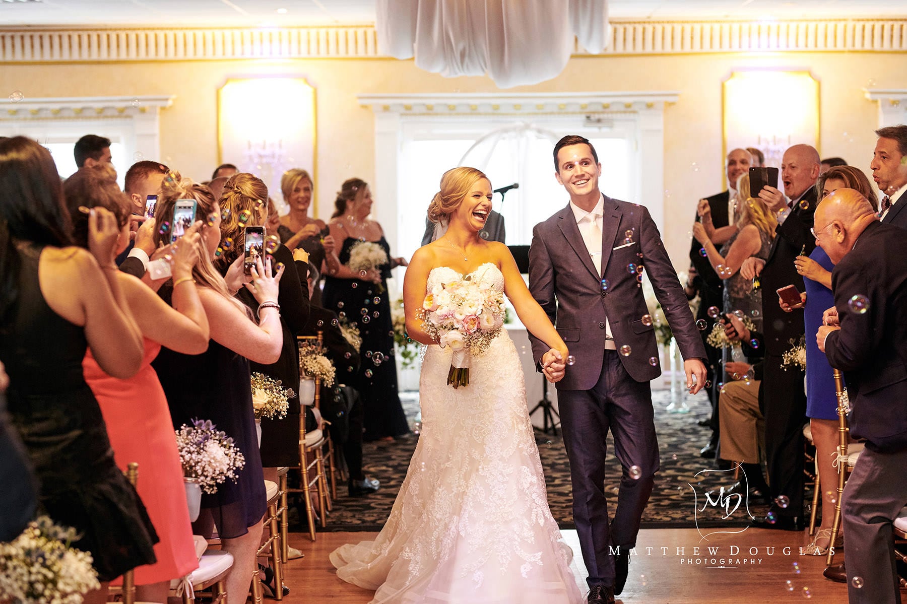 Chandelier Flanders Valley Wedding ceremony exit photo