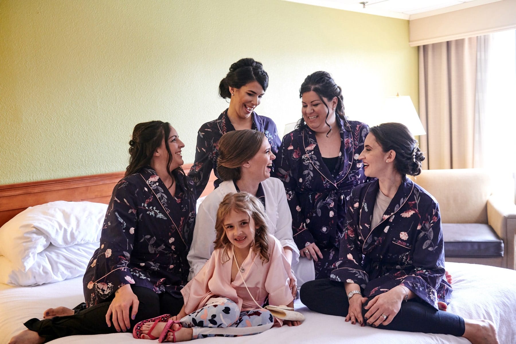 Bridesmaids on the bed photo
