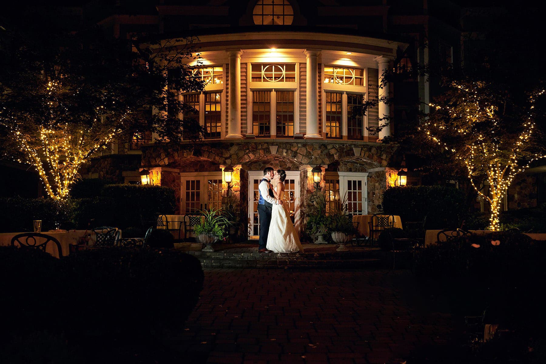 olde mill in wedding photo at night