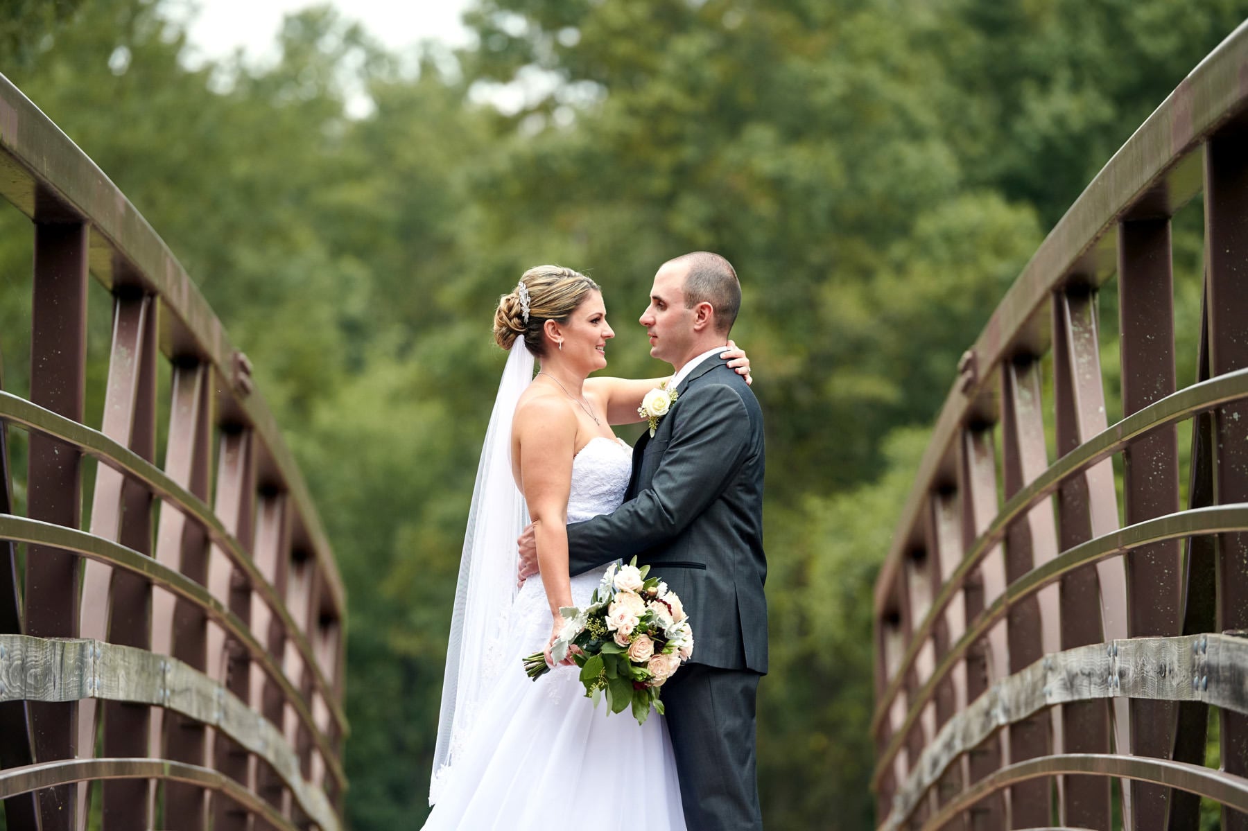 wedding photo on the bridge at colonial park nj