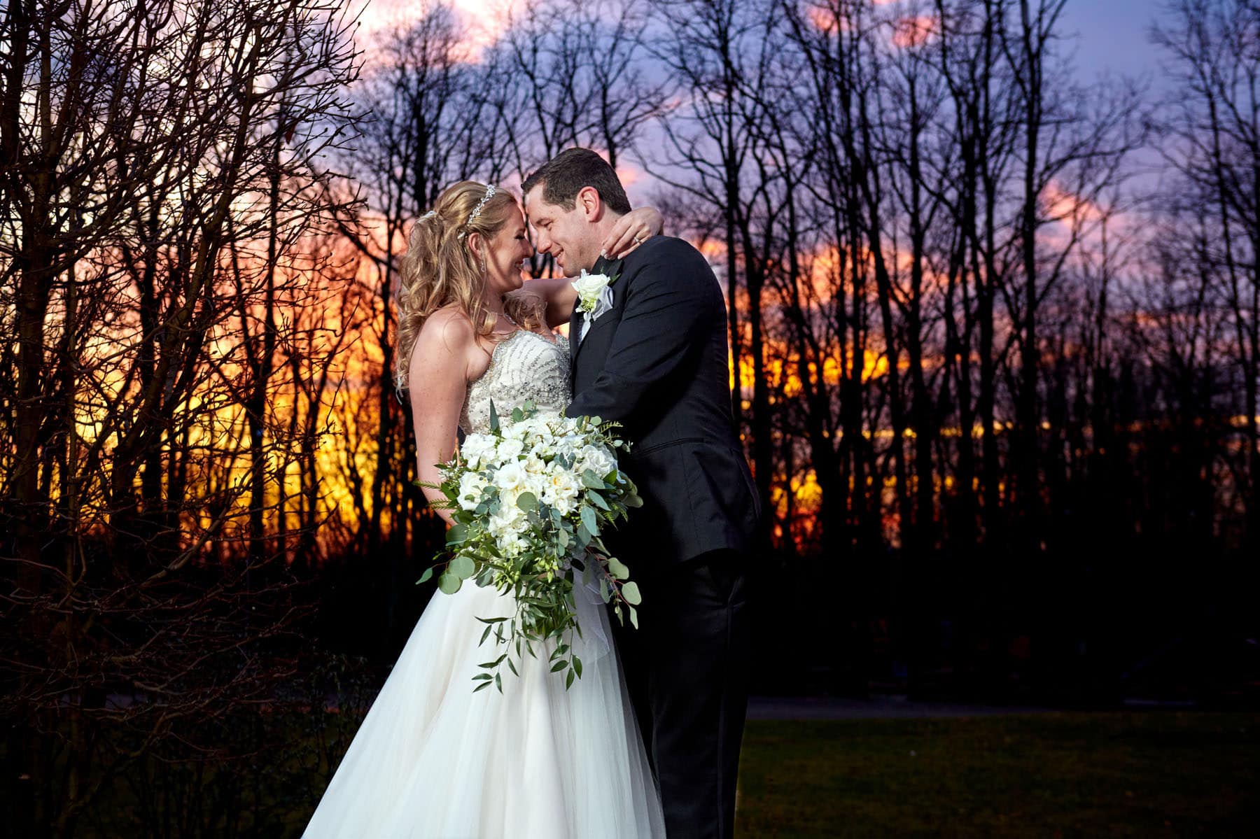 colorful sunset wedding photo at laurita winery