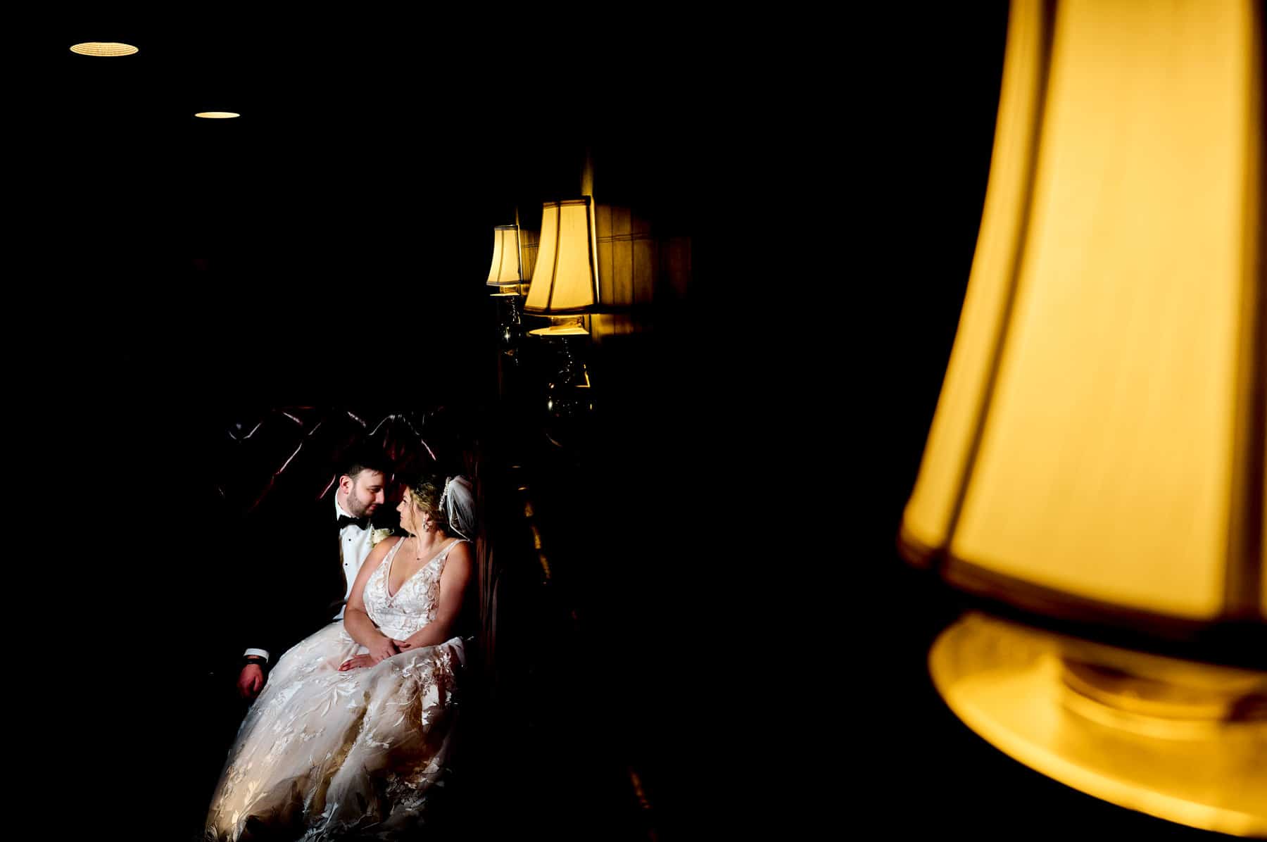 romantic indoor red bench wedding photo at The Farmhouse in Hampton NJ
