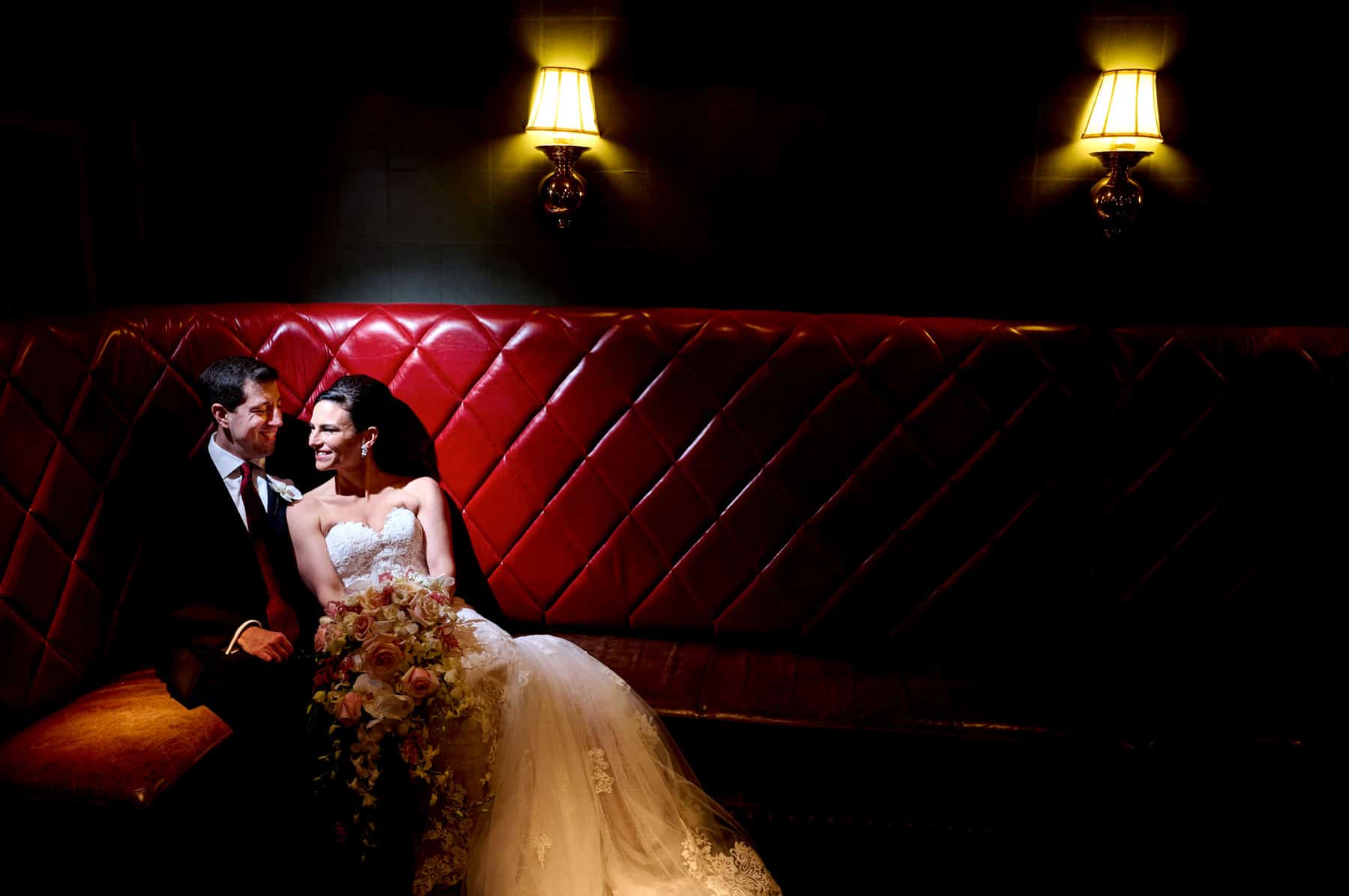 wedding photo on the red bench at The Farmhouse