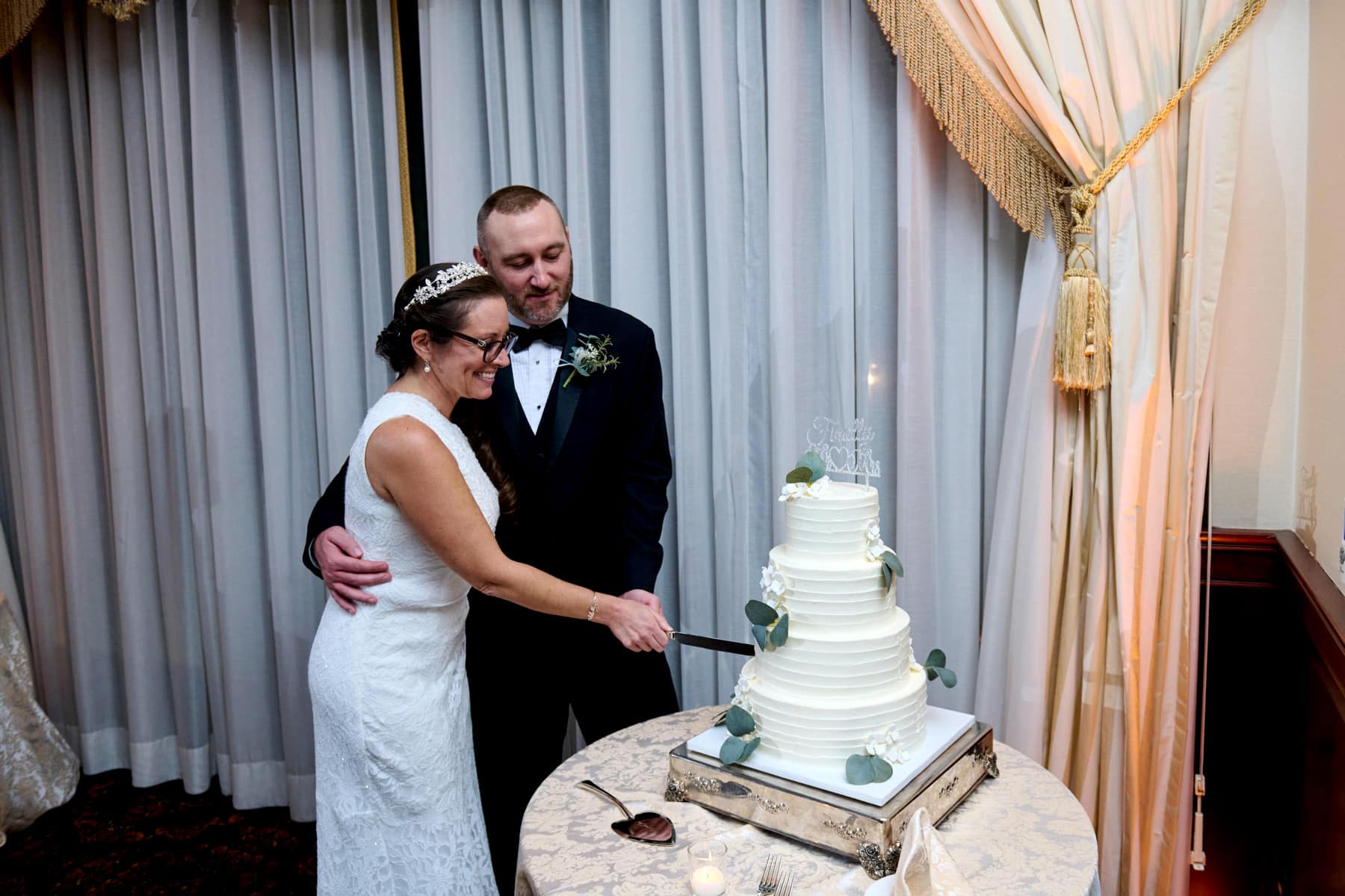 wedding cake cutting at The Nassau Inn