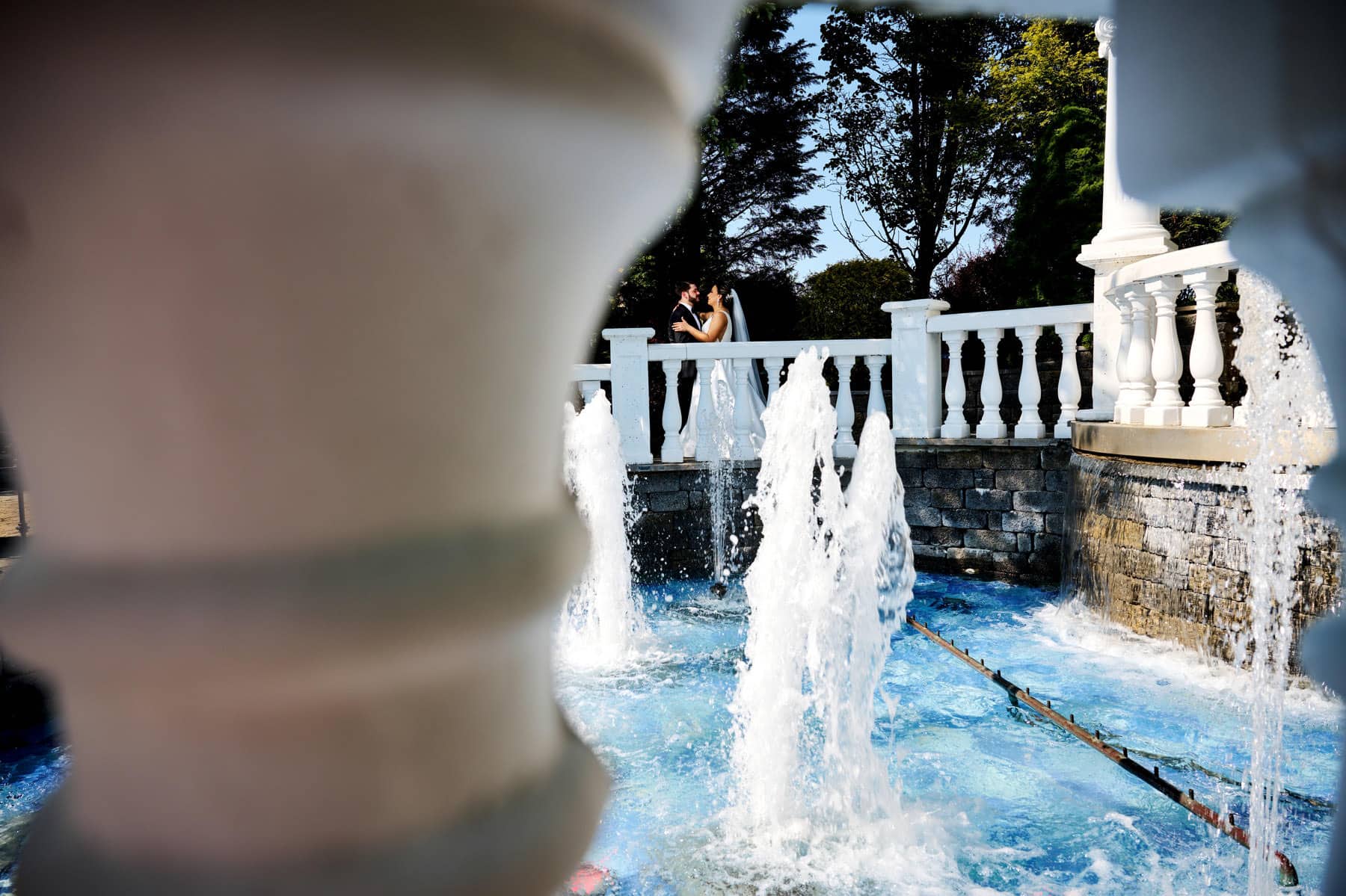 wedding photo by the fountain at The Westmount Country Club
