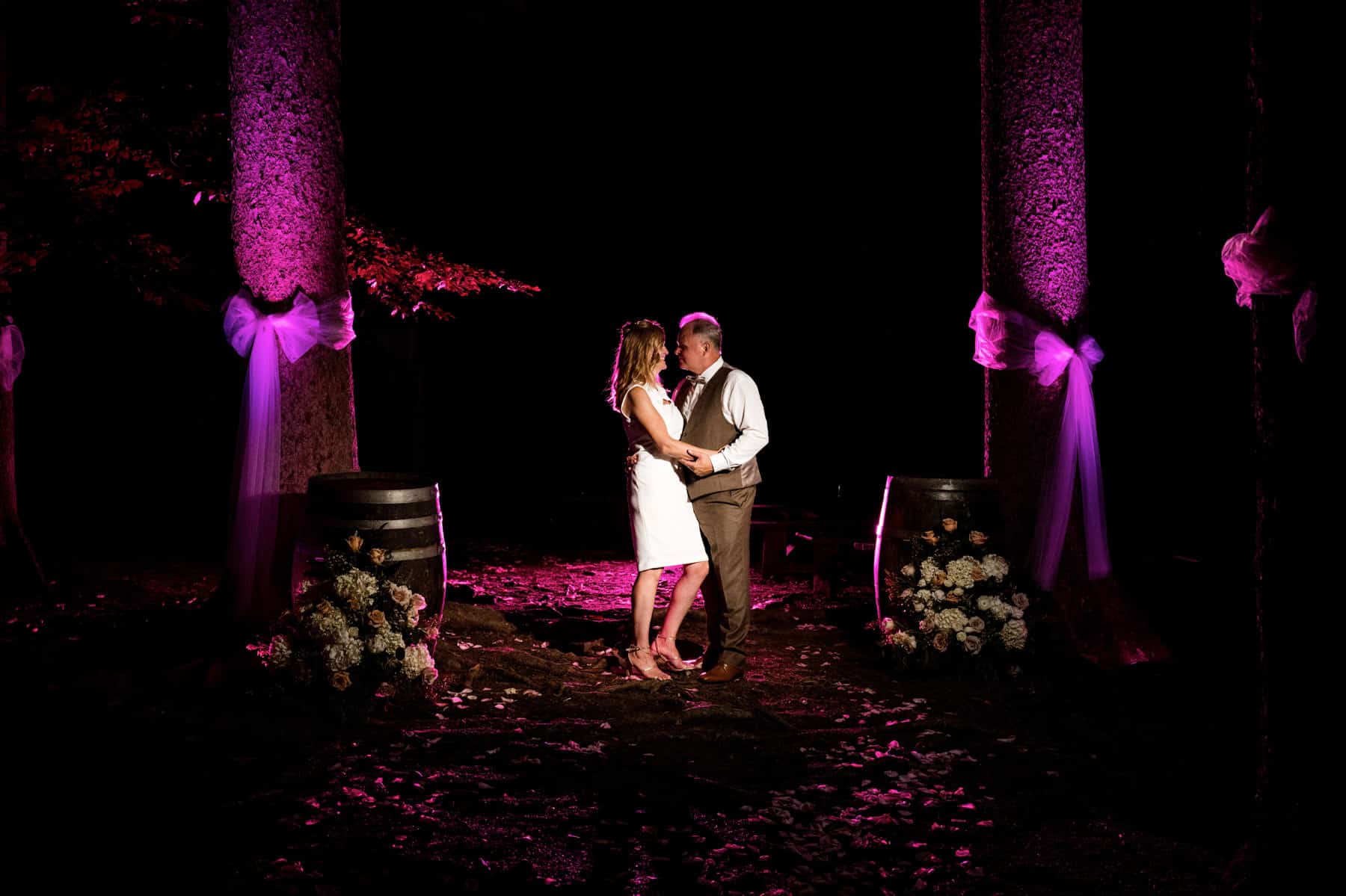 night time wedding photo in the trees at Maskers Barn