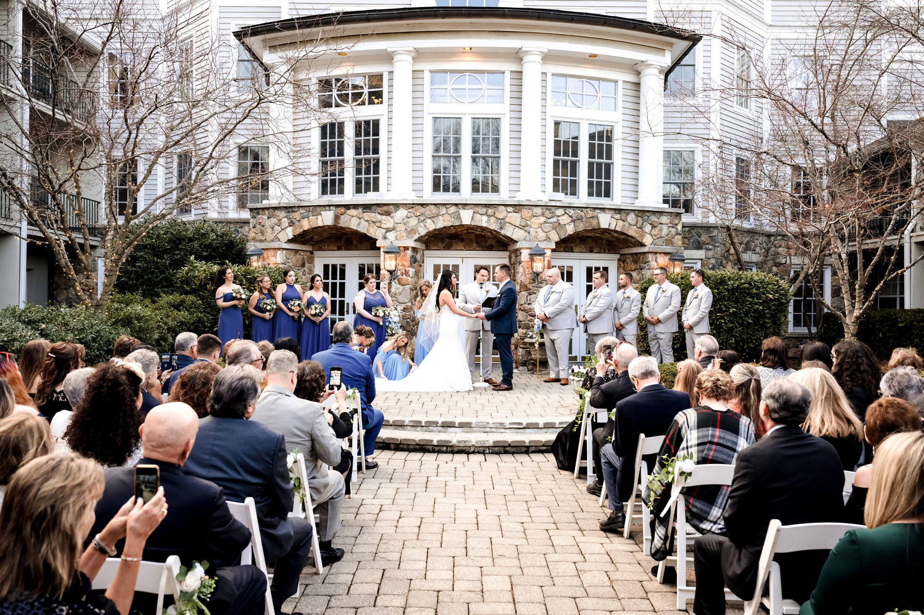 courtyard wedding ceremony at The Olde Mill Inn